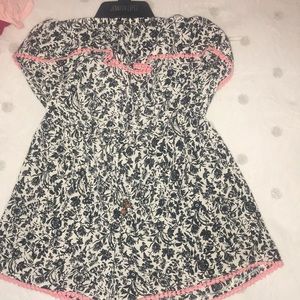 Floral off the shoulder romper.